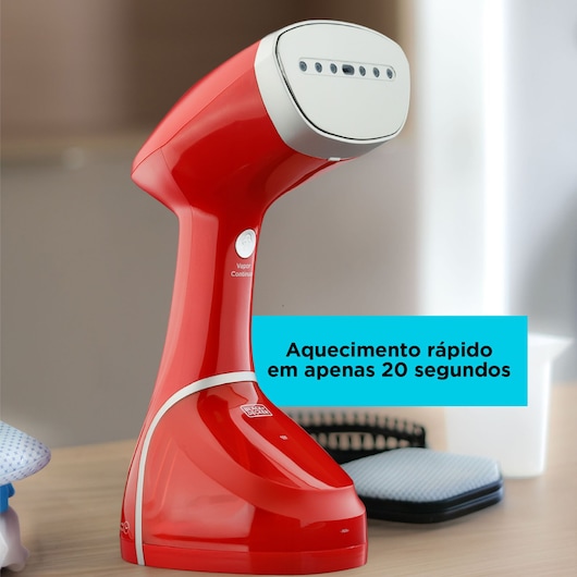 BLACKDECKER BDV2100 red handheld garment steamer on table, attachments in background, lateral angle.