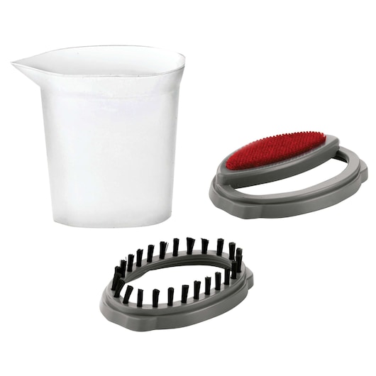 Set of three BLACK+DECKER BDV2000V photography accessories, including a translucent measuring cup, a gray oval brush attachment with black bristles, and a gray oval lint remover attachment with a red surface.
