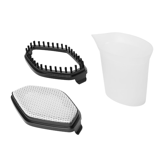 Three accessories for a steam garment appliance are shown: a black brush attachment with bristles, a white fabric mesh attachment, and a translucent plastic measuring cup.