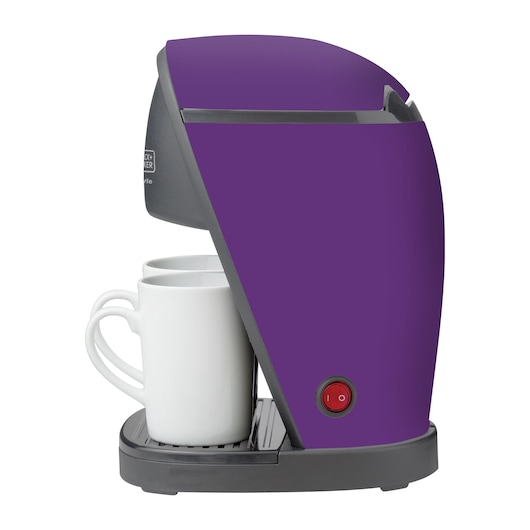 Photo of BLACK+DECKER CM02 purple single-serve coffee maker with two white mugs, side view on white background.