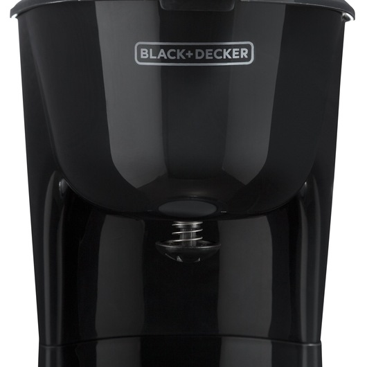 Photo of BLACKDECKER CM15 black coffee maker front view with drip spout visible.