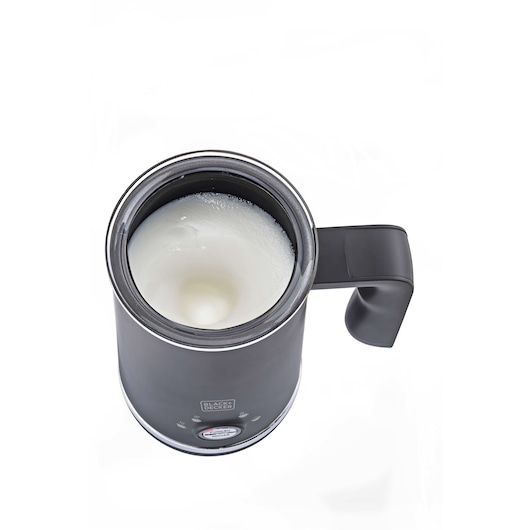 Photo of BLACKDECKER EL500 black electric milk frother with handle, top view, white milk foam inside.