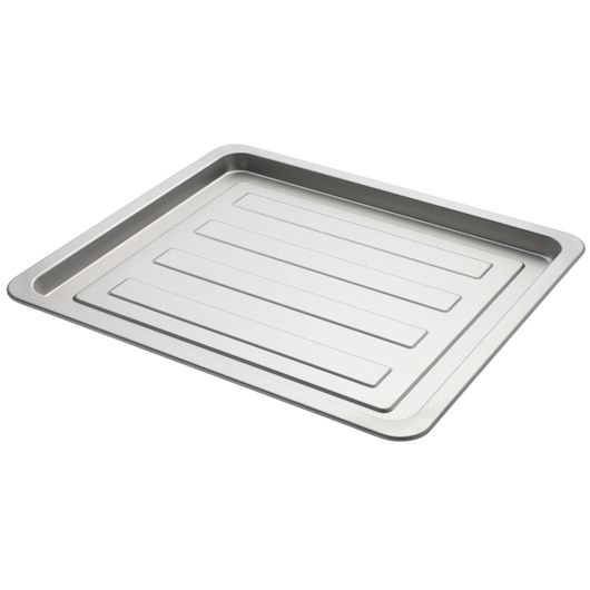 A rectangular metal baking tray with raised edges and horizontal grooves, photographed on a white background.