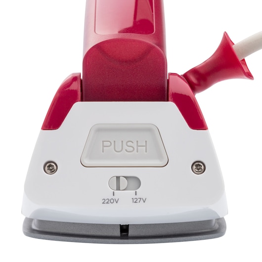 BLACKDECKER FXVG1 iron front angle showing voltage selector and push button.