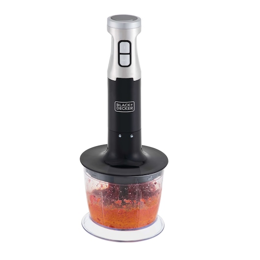 BLACK+DECKER MK600 hand blender with stainless steel and black handle, blending red mixture in clear container, front view.
