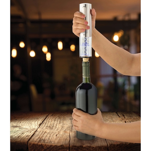 BLACKDECKER W10 electric wine opener extracting cork from wine bottle on wooden table.